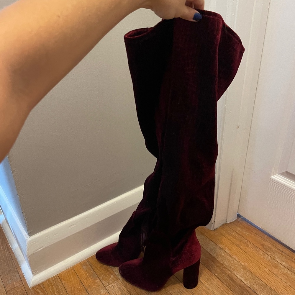 Red velvety thigh high heeled boots